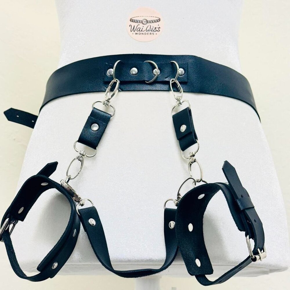 Black leather adjustable harness belt with handcuffs